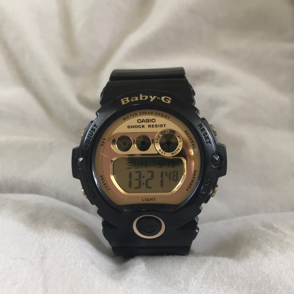G-shock women’s black and gold watch